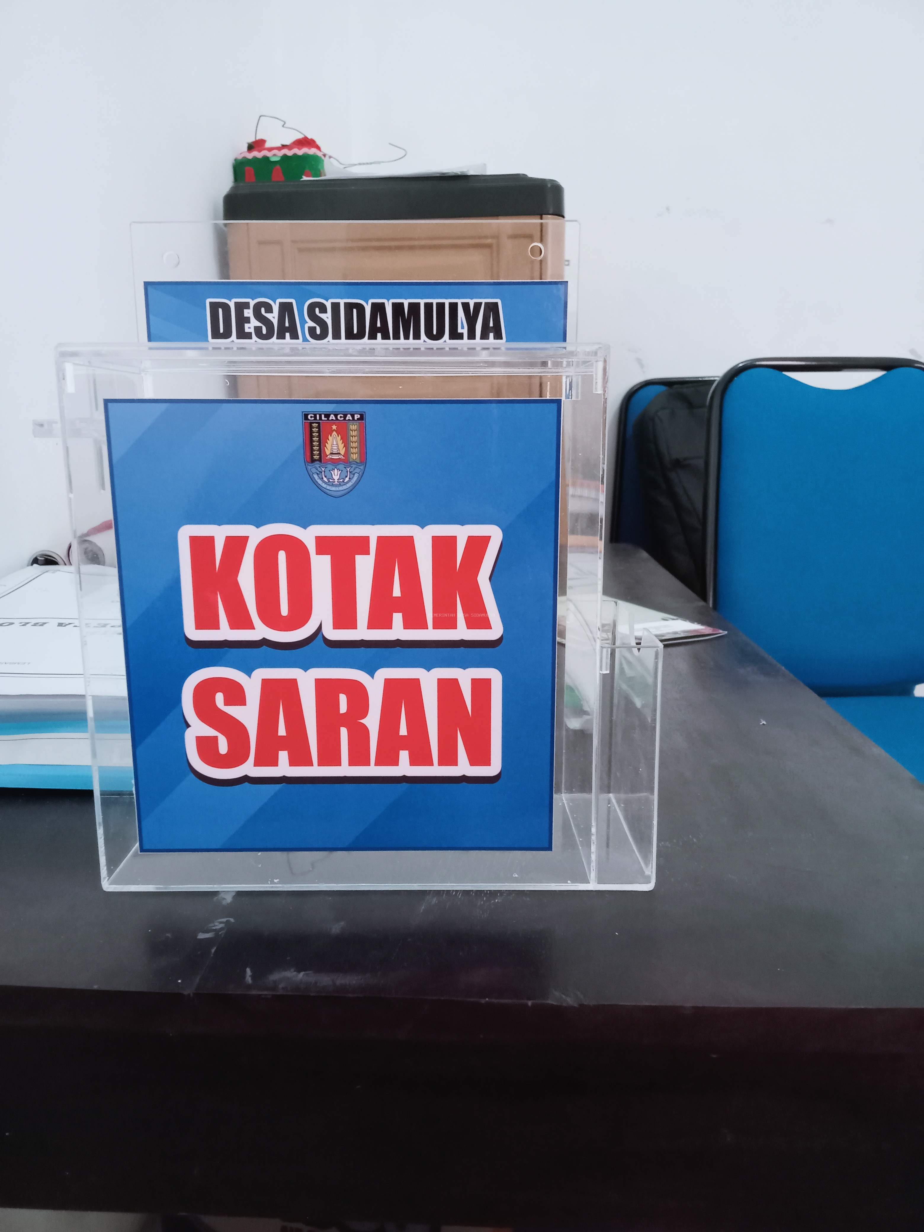 MEMBANGUN DESA MELALUI KOTAK SARAN DAN PENGADUAN  DI DESA SIDAMULYA